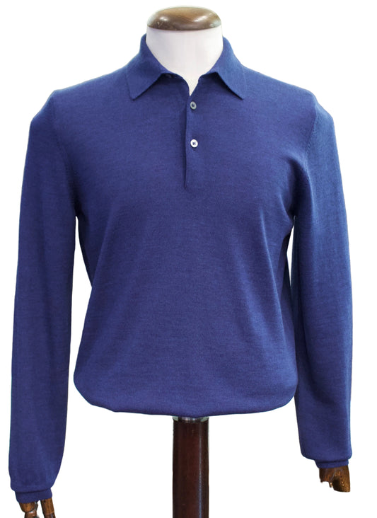 A long-sleeve knit polo shirt in a medium deep blue colour with black flecks, displayed on a mannequin torso , white background.