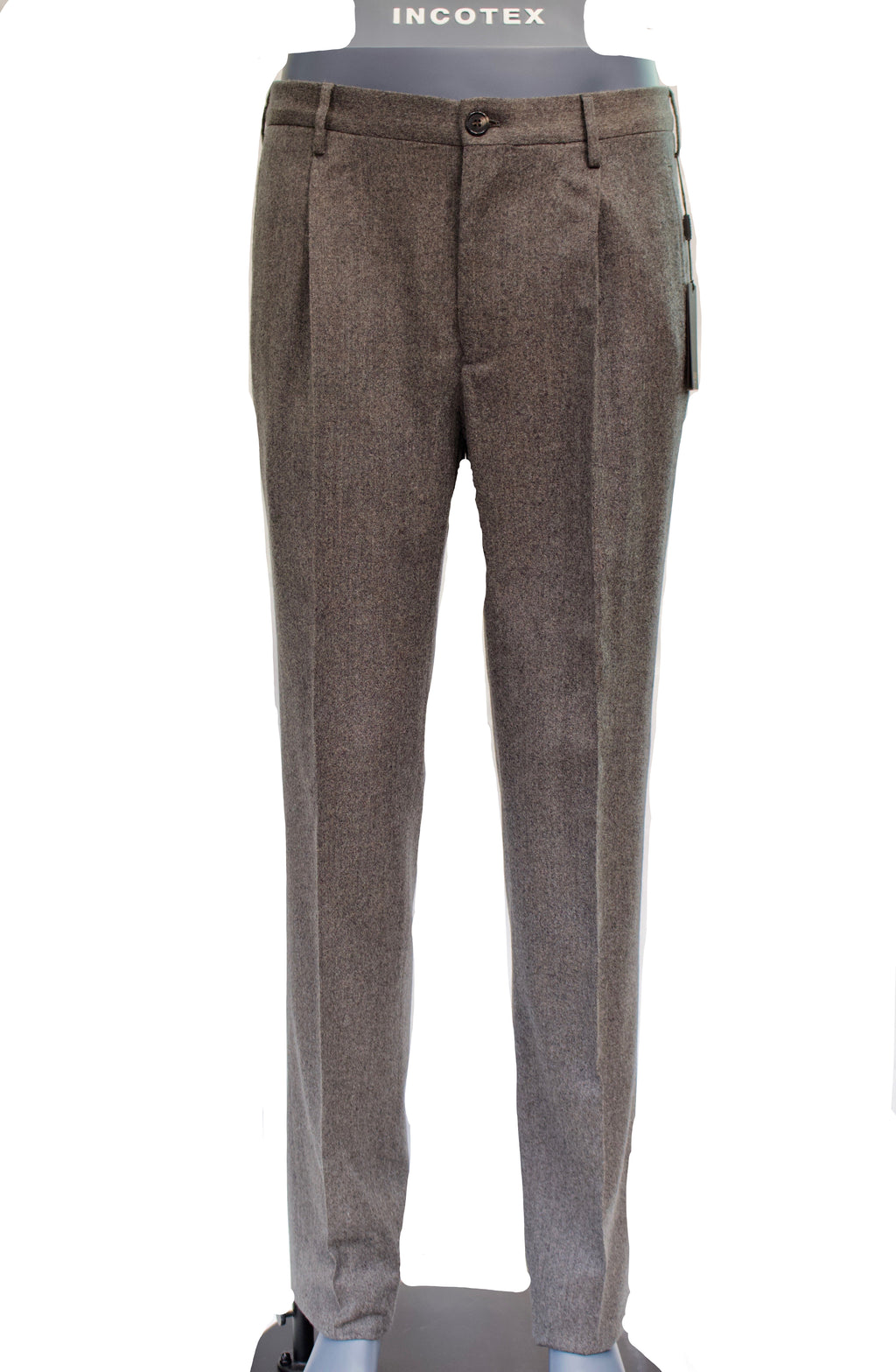 Brown textured pants on a mannequin with a white background