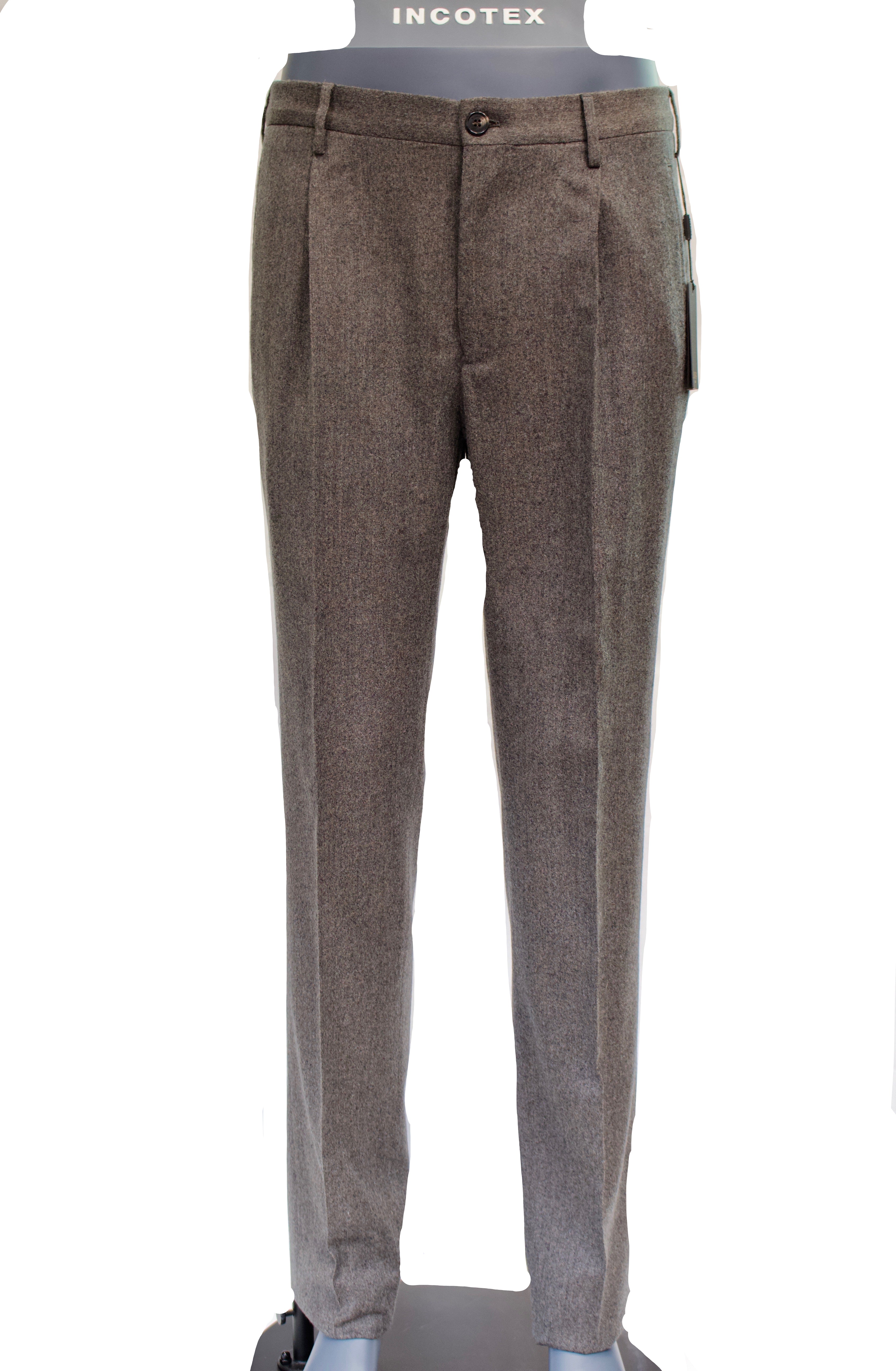 Brown textured pants on a mannequin with a white background