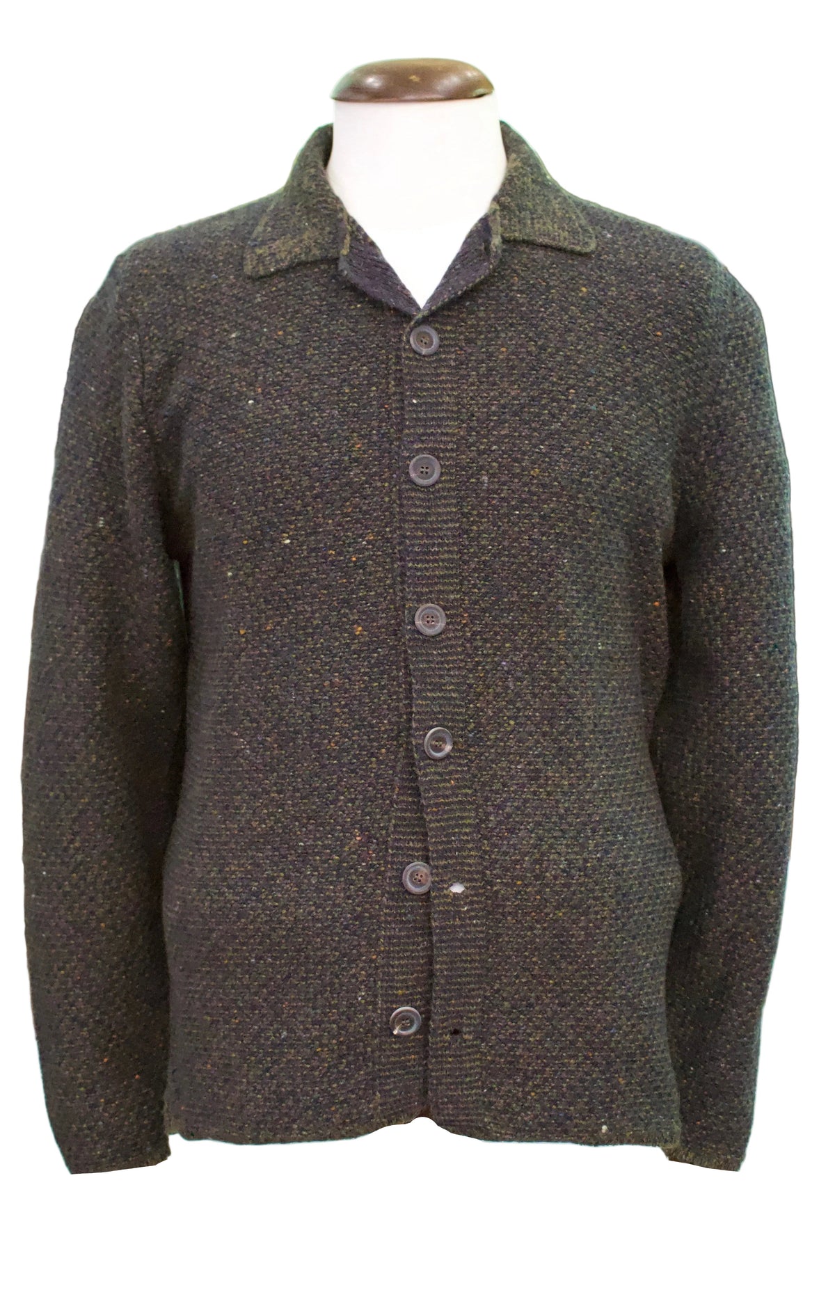 A photo of a textured wool cashmere olive green knitwear with orange flecks on a mannequin on a white background. 