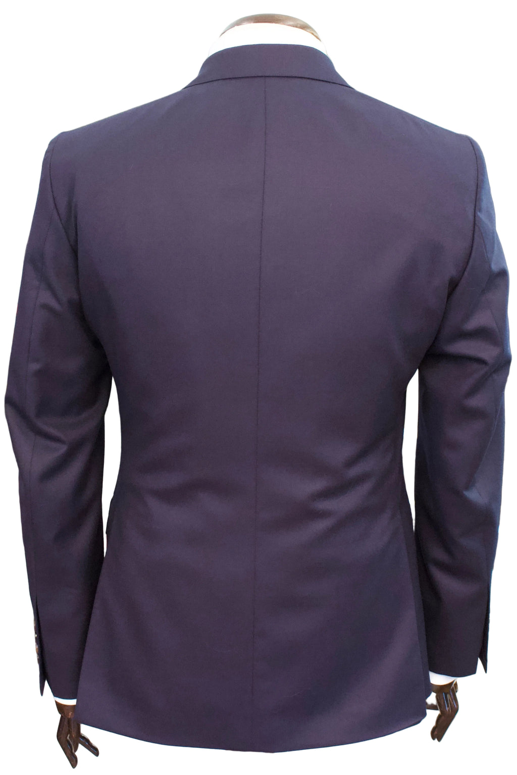 A dark navy tailored suit jacket displayed on a mannequin from the back, showing a clean center seam and structured shoulders.